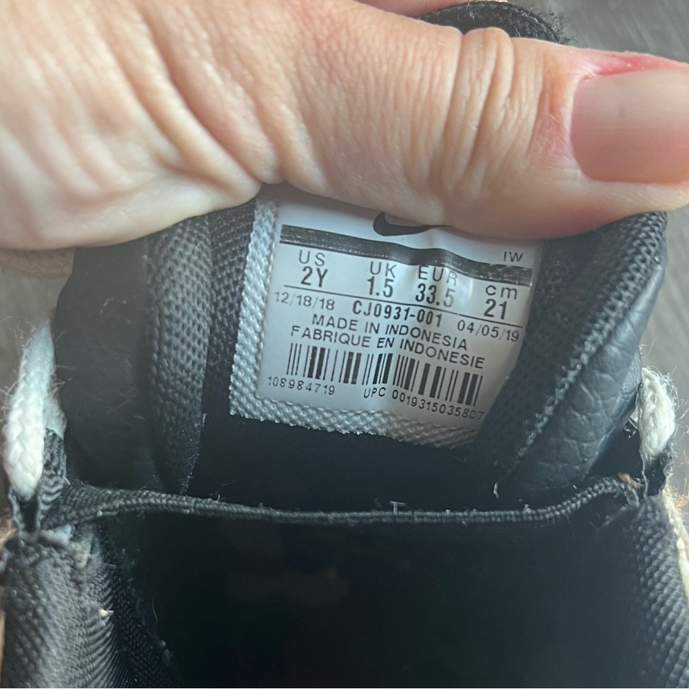 Nike air youth size 2 sneakers.